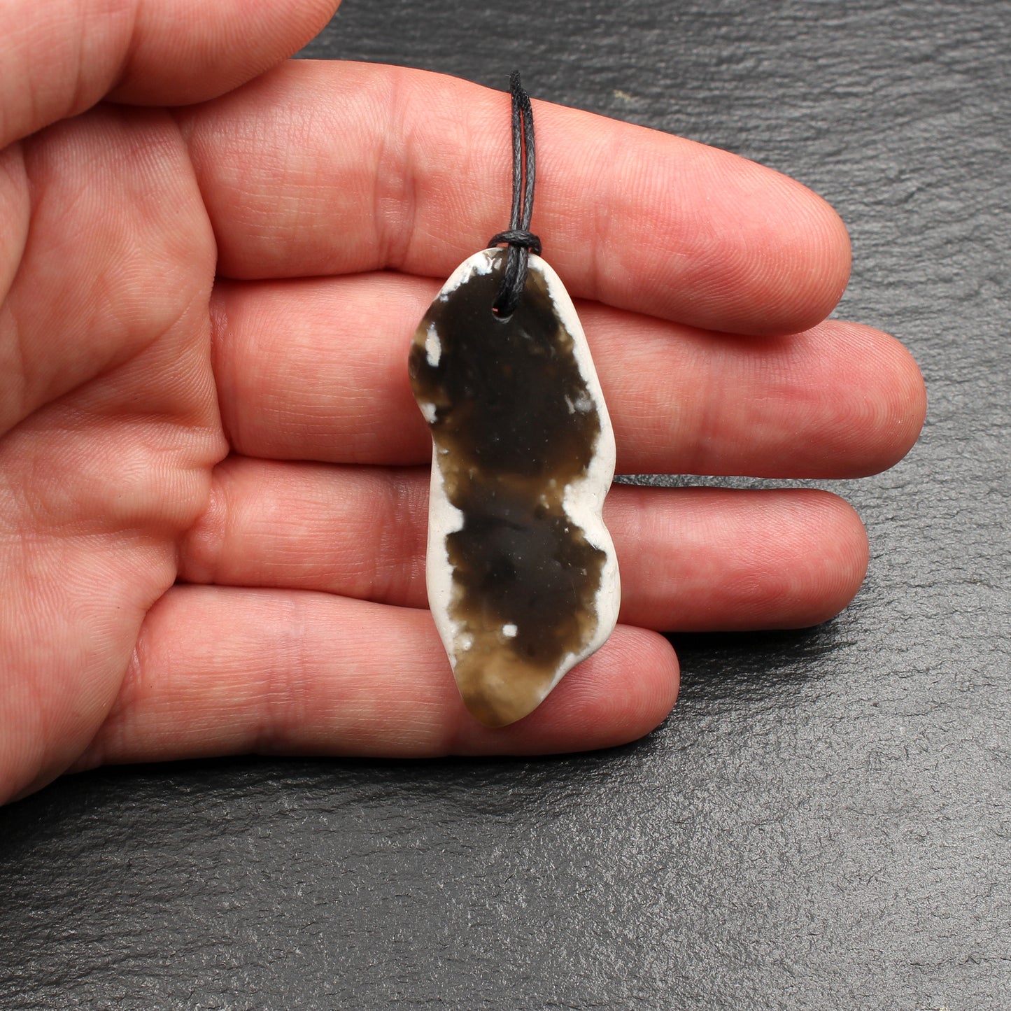 Nordsee Feuerstein Anhänger - Handarbeit