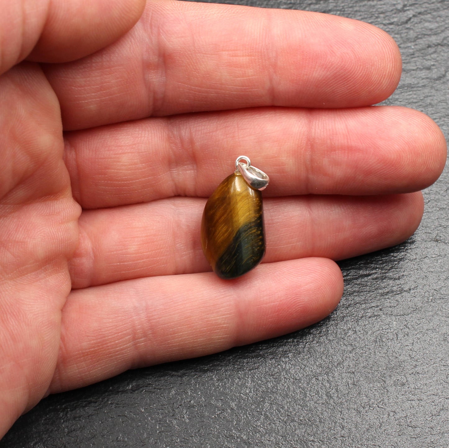 Tiger's eye / hawk's eye tumbled stone pendant